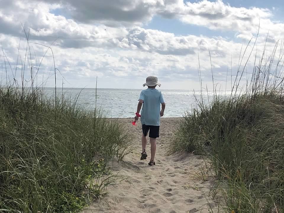 Child walks to the beach at Cape Hatteras National Seashore