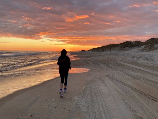 runner at sunset on the beach in Cape Hatteras National Seashore