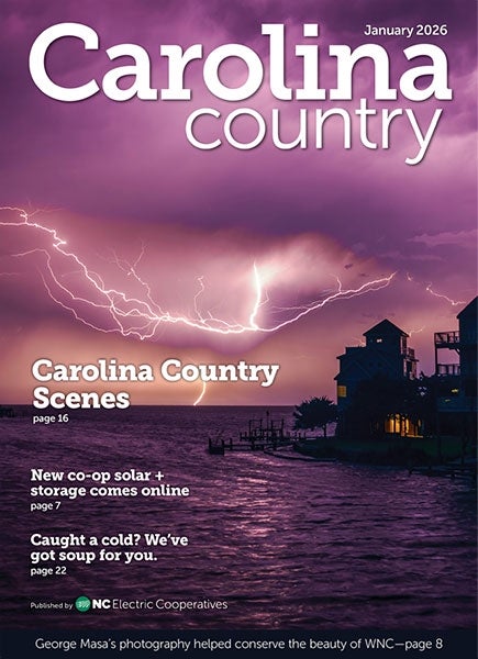 January Carolina Country Cover Purple Sky with lightning over the Pamlico Sound on Hatteras Island, NC