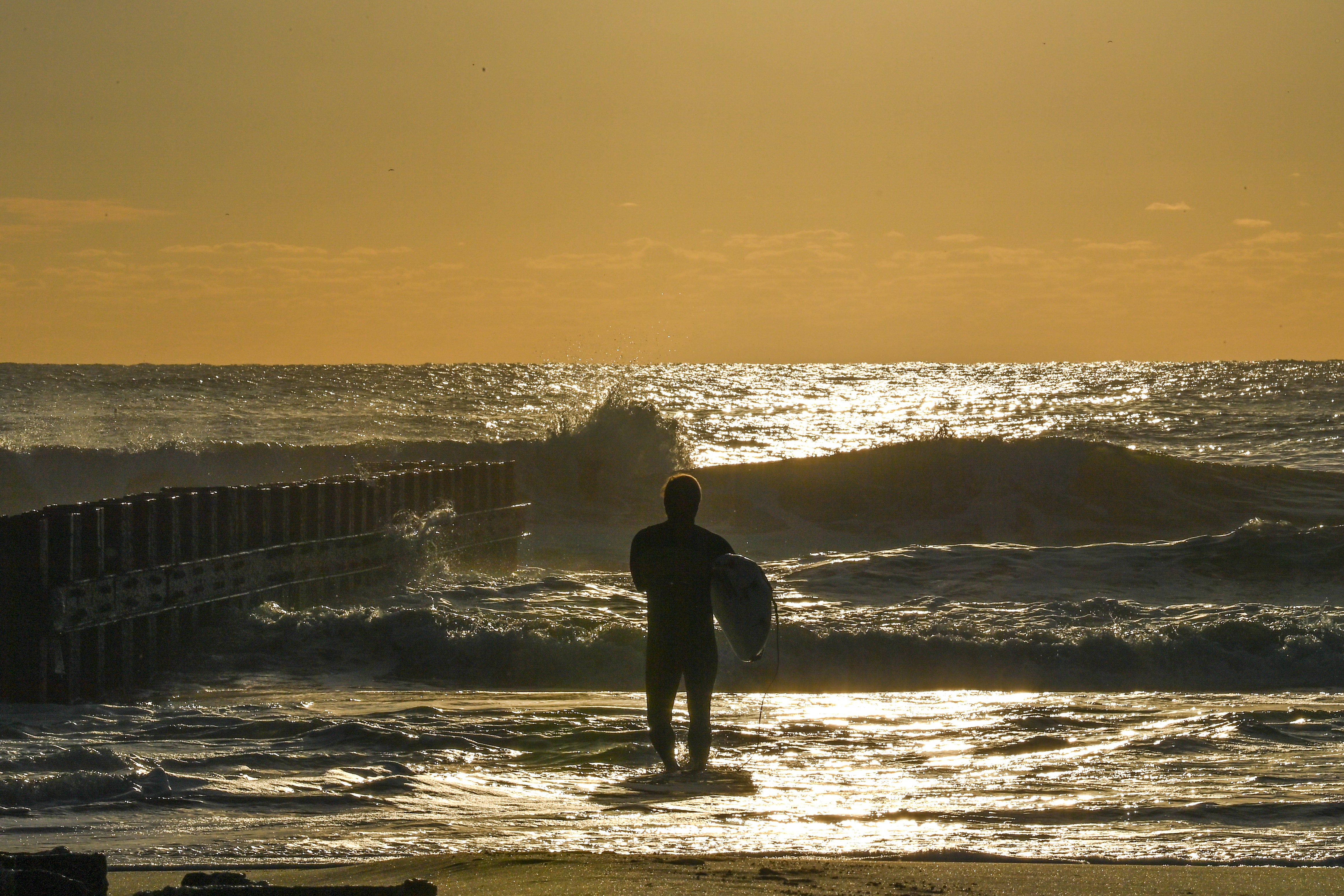 Surfer at Buxton Beach Hatteras Island