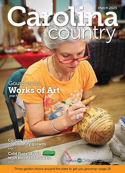 March Carolina Country Cover, Artist sketching on a gourd