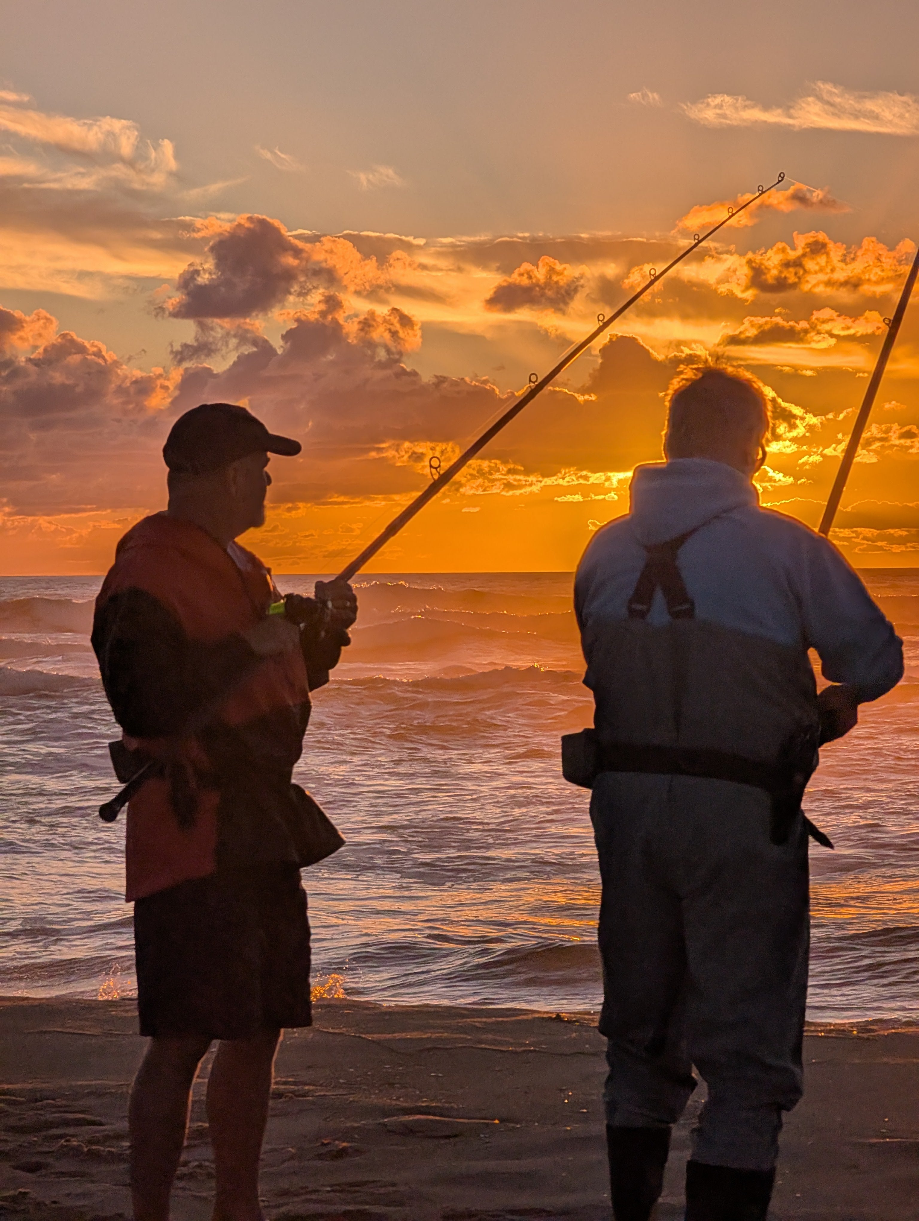 Fishermen on the beach at Cape Point Hatteras Island NC