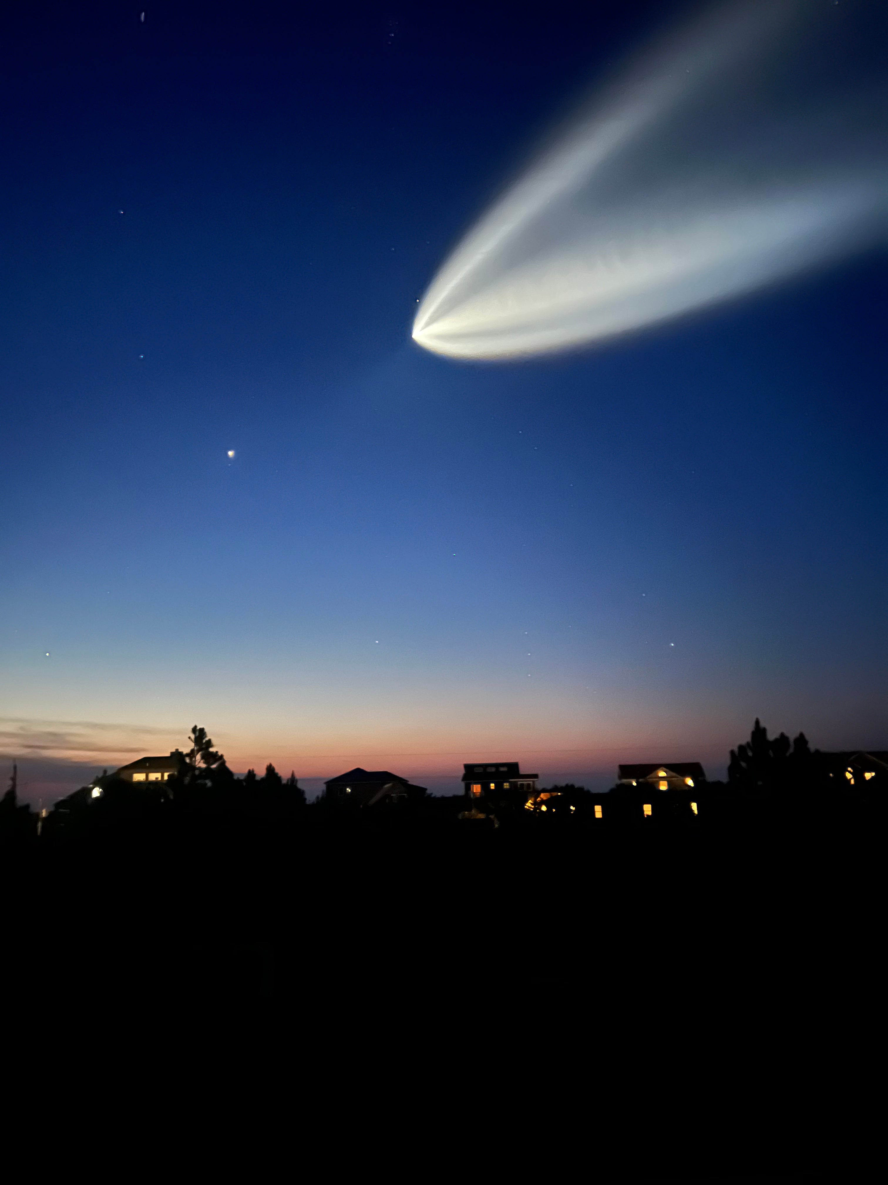 Space X Falcon shooting through the night sky