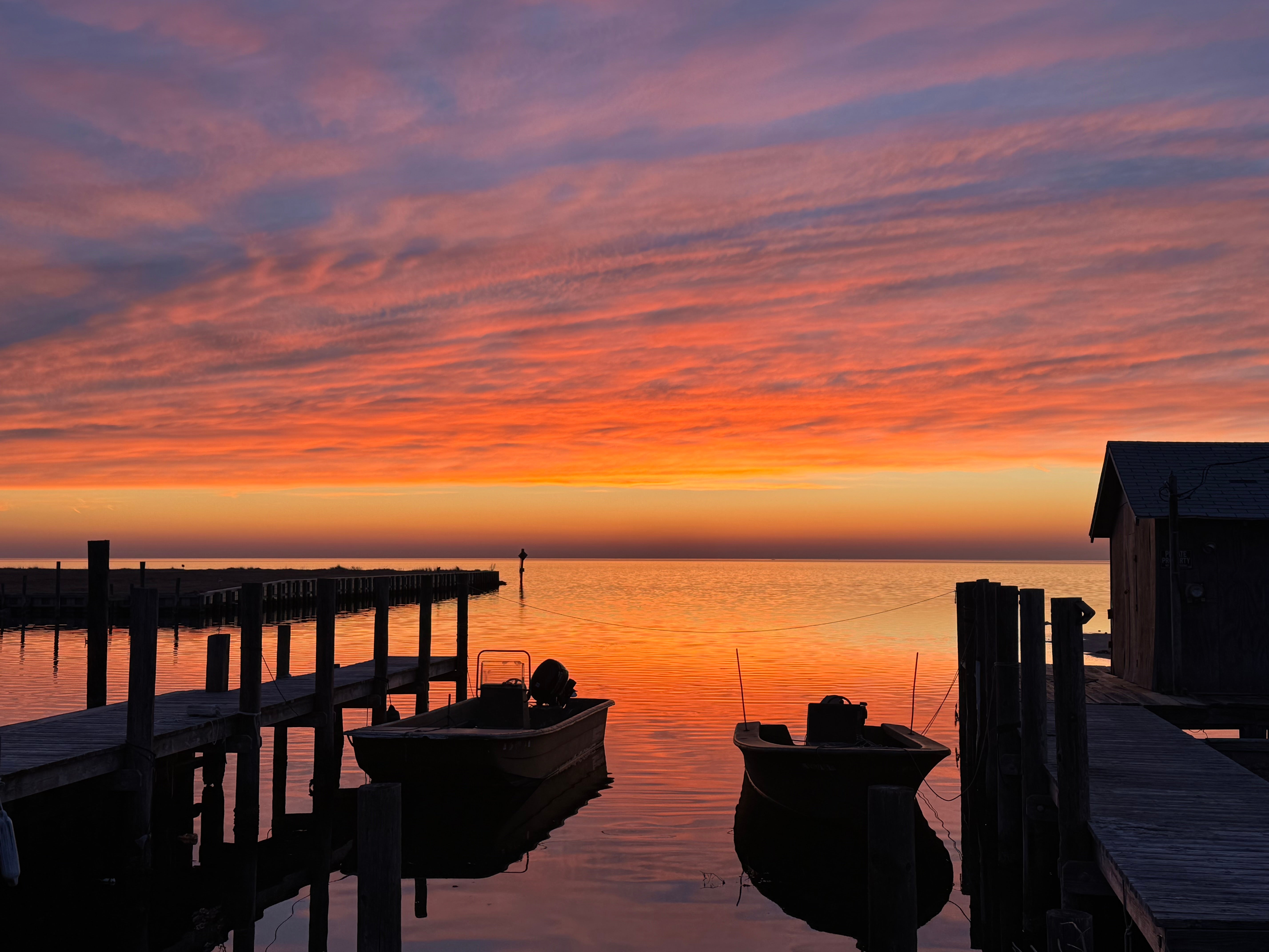Avon Harbor Sunset with orange and red skies