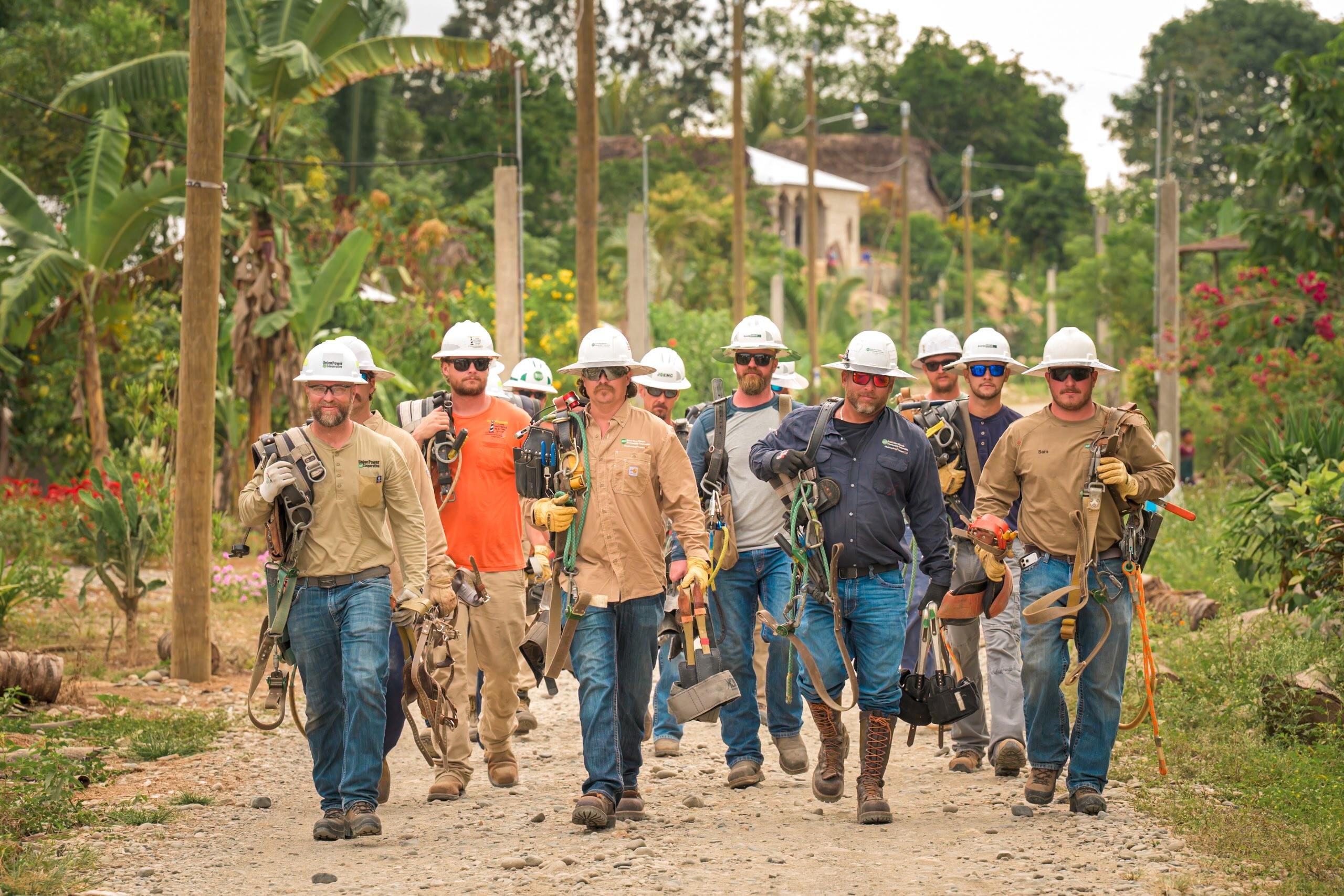NC LIneworkers in rural Guatemala during electrification trip