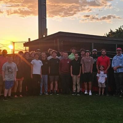 CHSS Baseball players and coaches with newly purchased batting cage