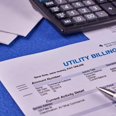 Picture of utility bill and calculator